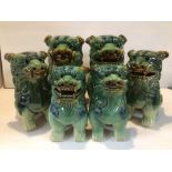 THREE VINTAGE PAIRS OF CHINESE CERAMIC TEMPLE GUARDIAN FU DOGS LARGEST BEING 20CM X 25CM.