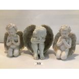 THREE WHITE RESIN CHERUB ANGEL FIGURINES / ORNAMENTS.