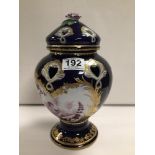 MINTON STYLE COBALT BLUE AND GILDED VASE, WITH LID. IN CHERUB AND FOLIAGE DECORATION. 27CM HIGH.