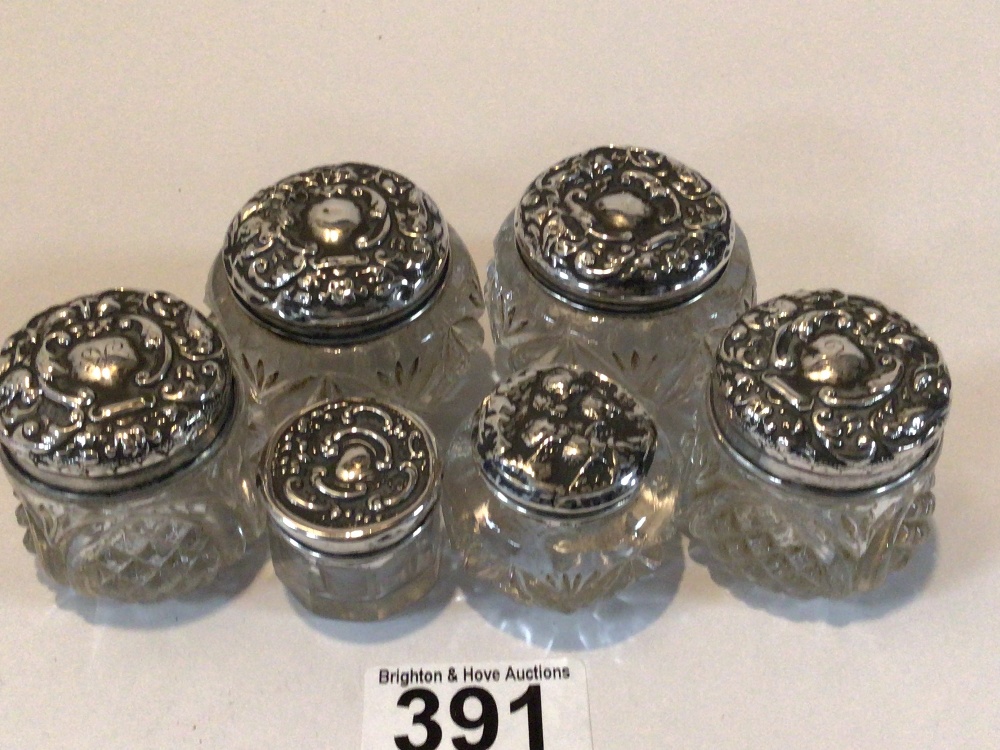 SIX HALLMARKED SILVER EMBOSSED TOP GLASS TOILET BOTTLES - Image 3 of 3