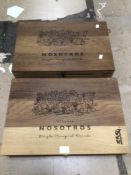 TWO WOODEN MENDOZA NOSOTROS WINE BOXES (WINE NOT INCLUDED). BOTH STORE SIX BOTTLES EACH. 54CM X 37CM