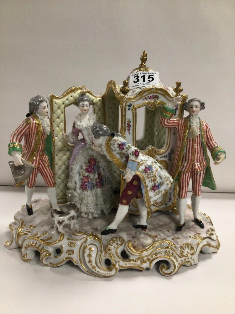 SAMPSOM FIGURAL GROUP OF A LADY WITH TWO FOOTMEN AND A GENTLEMAN RECEIVING THE LADY FROM THE
