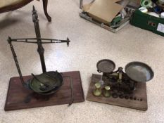 TWO VINTAGE BRASS KITCHEN SCALES, WITH WEIGHTS.