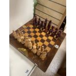 VINTAGE CARVED WOOD FOLDING CHESS SET WITH BRASS HANDLES AND DRAWERS. A/F. UNFOLDED: 46CM X 46CM X