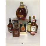 EIGHT VINTAGE SEALED BOTTLES OF WHISKY, INCLUDING SCOTCH, IRISH AND CANADIAN. TWO CHEVAS REGAL (