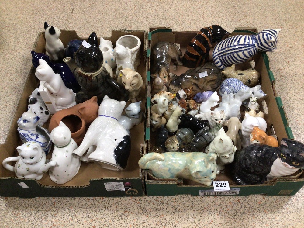 TWO BOXES OF CERAMICS MODEL CATS, TEA POTS AND MORE