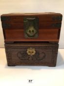 TWO ORIENTAL MAHOGANY BOXES WITH BRASS LOCKS. ONE CARVED STORAGE BOX AND THE OTHER BRASS BOUND