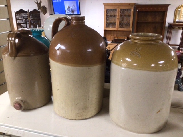 THREE LARGE STONEWARE JUGS/JARS. ONE POWELL AND THE OTHER GOVANCROFT. TOGTHER WITH ONE SMALLER