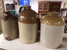 THREE LARGE STONEWARE JUGS/JARS. ONE POWELL AND THE OTHER GOVANCROFT. TOGTHER WITH ONE SMALLER