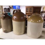 THREE LARGE STONEWARE JUGS/JARS. ONE POWELL AND THE OTHER GOVANCROFT. TOGTHER WITH ONE SMALLER