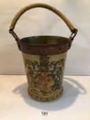 VINTAGE ENGLISH LEATHER ON COPPER HANDLED FIRE BUCKET WITH COAT OF ARMS.