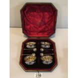 SET OF FOUR CASED VICTORIAN HALLMARKED SILVER EMBOSSED CIRCULAR SALTS WITH MATCHING SPOONS 1896 BY
