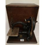 VINTAGE CASED WILCOX & GIBBS HAND-CRANK SEWING MACHINE. (SERIAL NUMBER ILLEGIBLE).