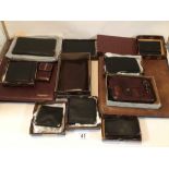 EXTENSIVE BOXED COLLECTION OF LE TANNEUR LEATHER WALLETS WITH LEATHER BINDER AND SLEEVE.