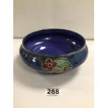 ROYAL DOULTON GLAZED STONEWARE CIRCULAR FRUIT BOWL WITH TUBE LINED FLORAL DECORATION BY MAUD BOWDEN,