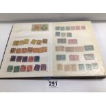 STAMP ALBUM WITH EARLY STAMPS, QUEEN VICTORIA TWO CENTS CANADIAN