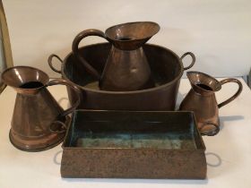 FIVE VINTAGE COPPERWARE ITEMS. THREE JUGS / PITCHERS, A POT, AND A TROUGH / PLANTER.