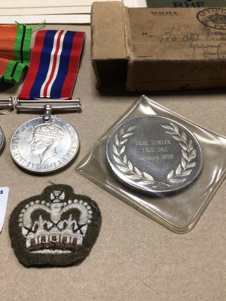 TWO WW2 MEDALS BOXED WITH LAPELS/ CLOTH BADGES, 1944 SPEECH, RE-UNION DINNER, AND T. A. COIN - Image 3 of 5