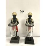 TWO SMALL BRONZE BLACKAMOORS HANDLING GLASS VASES, 21CM