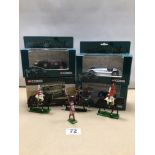 FOUR DIE-CAST CORGI VEHICLES WITH FOUR PAINTED LEAD SOLDIERS INCLUDING THREE ON HORSEBACK.