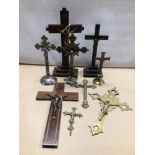 NINE MIXED VINTAGE METAL AND WOODEN ‘INRI’ CRUCIFIXES OF JESUS.