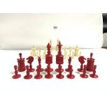 SET OF LATE 19TH CENTURY RED AND WHITE BONE CHESSMEN