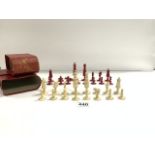 SET OF LATE 19TH CENTURY RED AND WHITE CARVED BONE CHESSMEN A/F