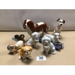 EIGHT VARIOUS CHINA DOGS INCLUDING BESWICK SPANIEL AND ROYAL DOULTON DALMATIAN.