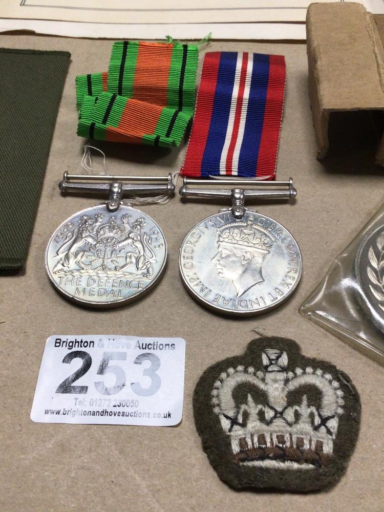 TWO WW2 MEDALS BOXED WITH LAPELS/ CLOTH BADGES, 1944 SPEECH, RE-UNION DINNER, AND T. A. COIN - Image 2 of 5