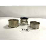 HALLMARKED SILVER CIRCULAR SALT WITH TWO HALLMARKED SILVER NAPKIN RINGS, 66 GRAMS OF SILVER