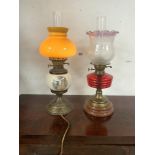 TWO OIL LAMPS ONE HAS BEEN CONVERTED TO ELECTRIC