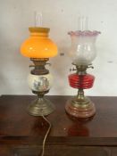 TWO OIL LAMPS ONE HAS BEEN CONVERTED TO ELECTRIC