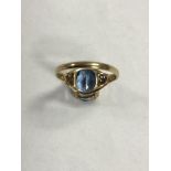 9CT GOLD RING WITH A TOPAZ STONE J. 5 SIZE