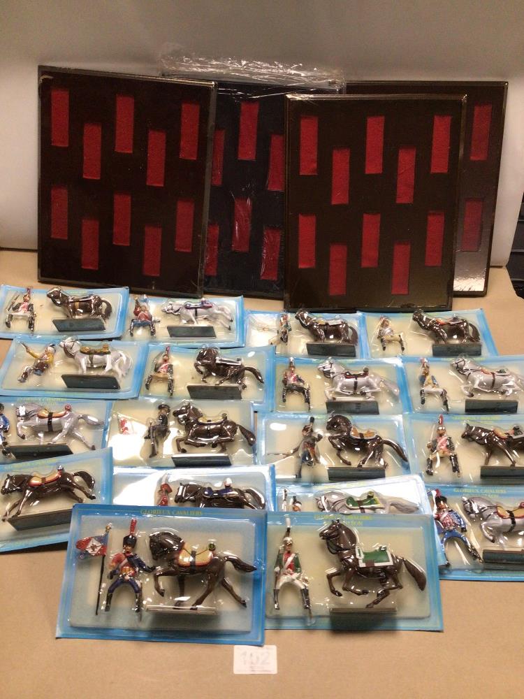 STARLUX COLLECTION OF NAPOLEON SOLDIERS AND HORSE FIGURES WITH STANDS.