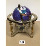 VINTAGE SEMI-PRECIOUS GEMSTONE ON LAPIS BLUE BASE WORLD GLOBE WITH BRASS STAND COMPASS. 26CM HIGH.