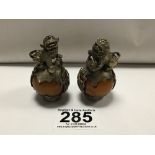 A PAIR OF WHITE METAL FOO DOGS WITH YELLOW JADE, 6