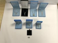 EIGHT 925 SILVER NECKLACES, PENDANTS, AND EARRING SETS WITH BOXES