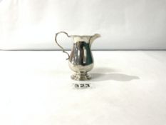 HALLMARKED SILVER BALUSTER SHAPED CREAM JUG, 9CM BIRMINGHAM 1922, MAKER WILLIAM HUTTON & SONS, 62