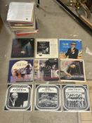 A LARGE QUANTITY OF LP'S WAR OF THE WORLDS BILLY HOLIDAY AND MORE