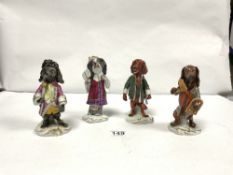 SET OF FOUR UNTER BACH PORCELAIN FIGURES OF DOGS IN 18TH CENTURY DRESS, 14CMS