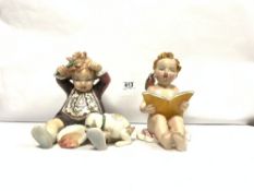 TWO ITALIAN CERAMIC FIGURES OF A CHILD SINGING AND SPLIT DINNER, 20CMS