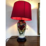 A MOORCROFT LILLY PATTERN TABLE LAMP 28 CMS