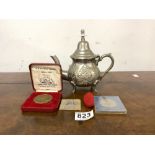 MIDDLE EASTERN TEAPOT WITH A ROYAL MINT BRONZE COIN WITH ONE OTHER