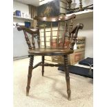 A STAINED BEECHWOOD STICK BACK KITCHEN ELBOW CHAIR