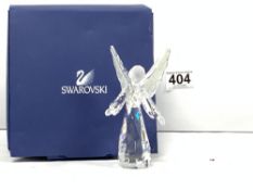 A SWAROVSKI CRYSTAL FIGURE OF AN ANGEL IN ORIGINAL BOX, 12CMS