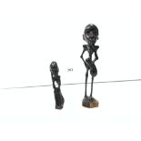 AFRICAN HARDWOOD FIGURE HOLDING A GUARD 20CMS AND ANOTHER FIGURE KNEELING, 12CMS