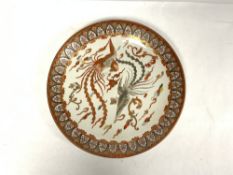 A 19TH CENTURY JAPANESE KUTANI PORCELAIN WALL PLATE, DECORATED WITH STYLISED BIRDS, 33CMS