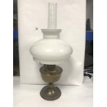 A BRASS OIL LAMP WITH GLASS SHADE, 60CMS