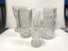 A HEAVY CUT GLASS VASE, 30CMS AND A BOHEMIA CRYSTAL GLASS VASE, 30CMS AND THREE OTHERS