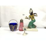 A PORCELAIN BLACKMOOR FIGURE SIGNED H MEISEL, 30CMS, A CRANBERRY SUGAR SIFTER, AND A PLATED SUGAR